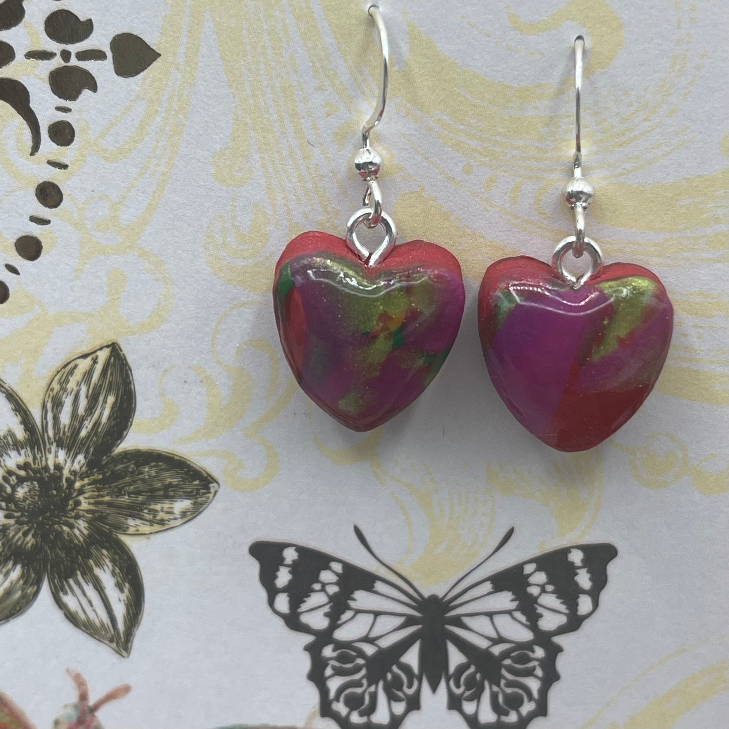 Small heart shaped pendant earrings